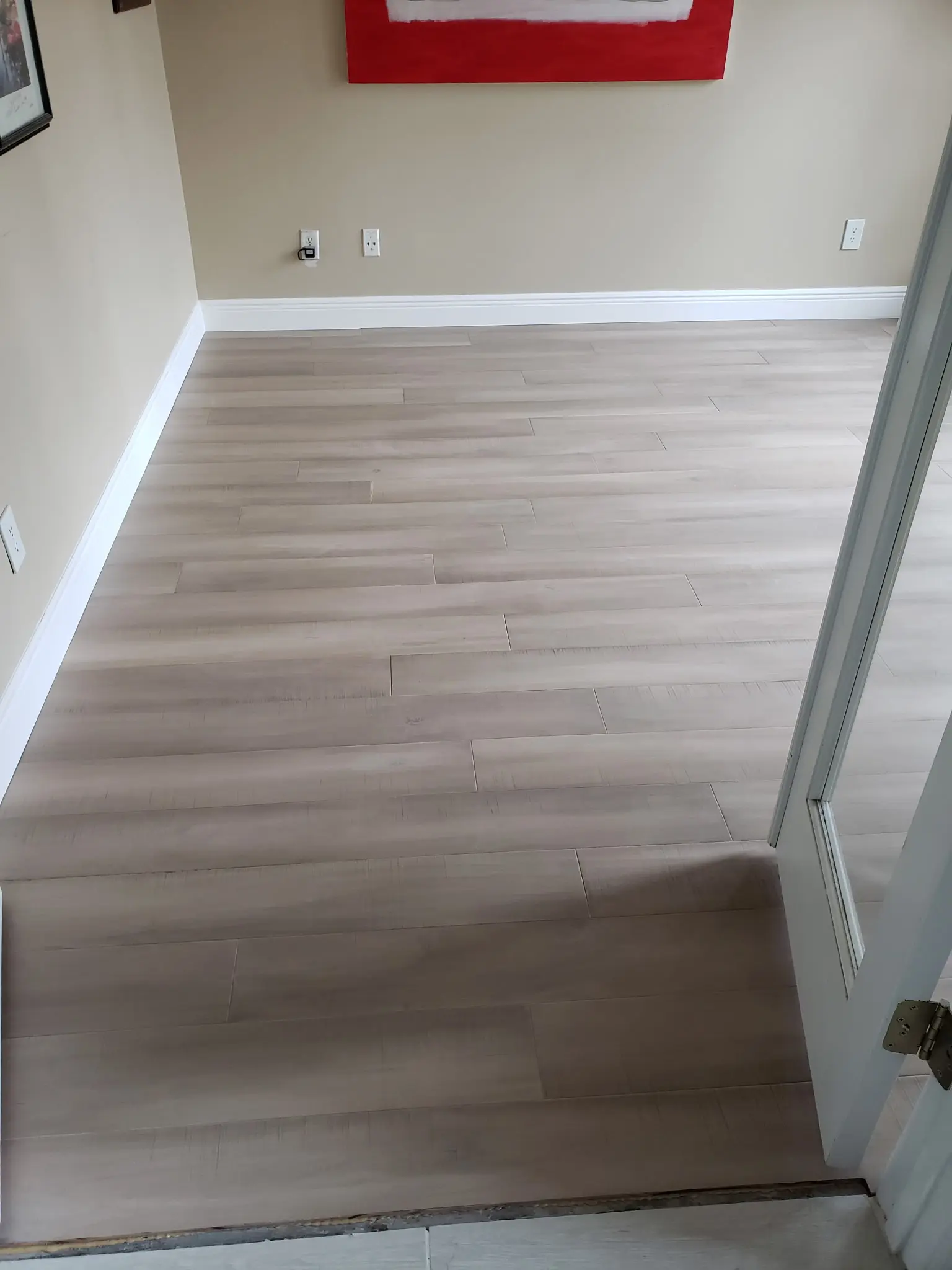 Light & Dark Plank Flooring completed by Shullin Boodoo Carpet Inc.