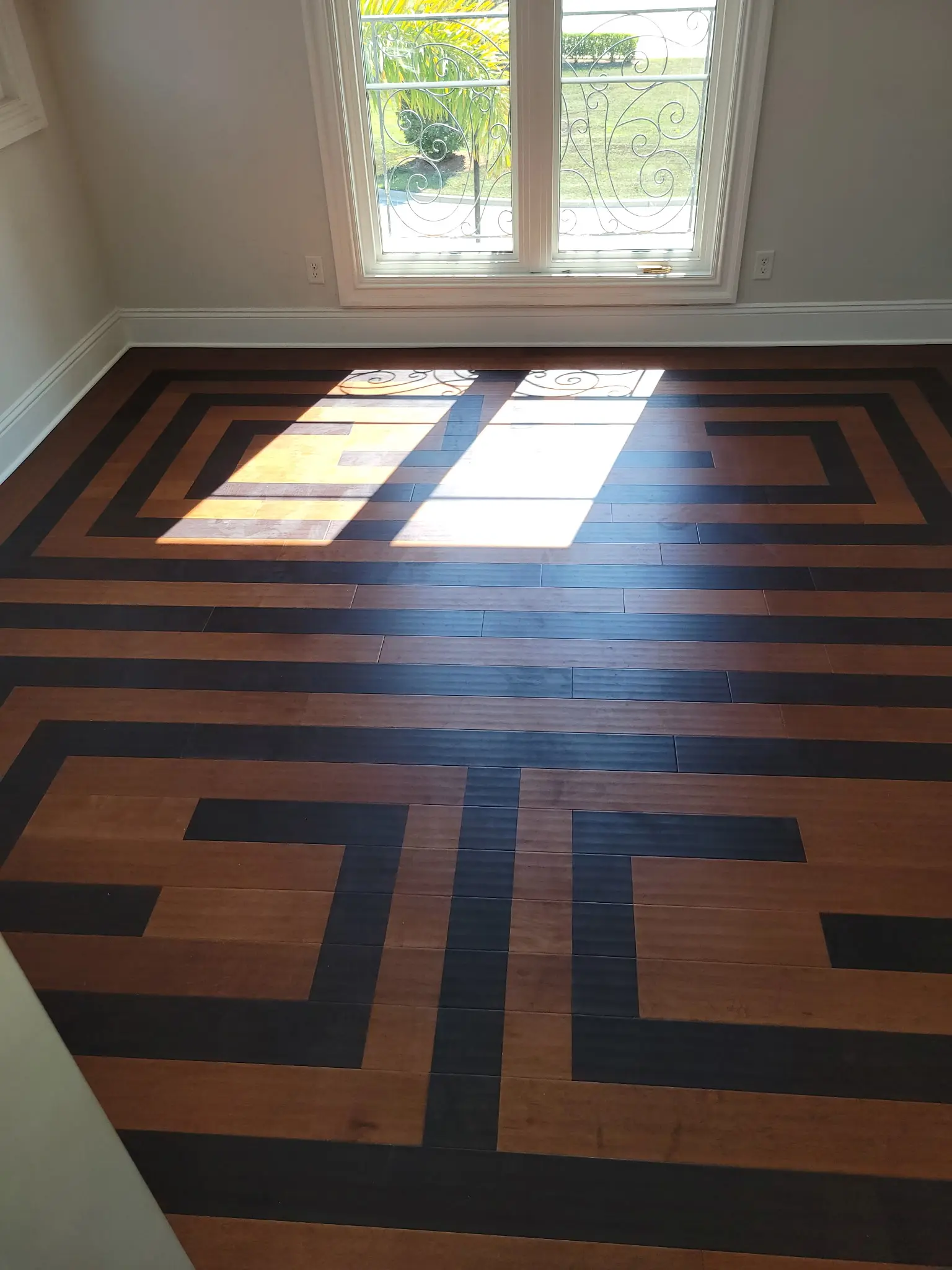Custom Two-Tone Greek Key Floor completed by Shullin Boodoo Carpet Inc.